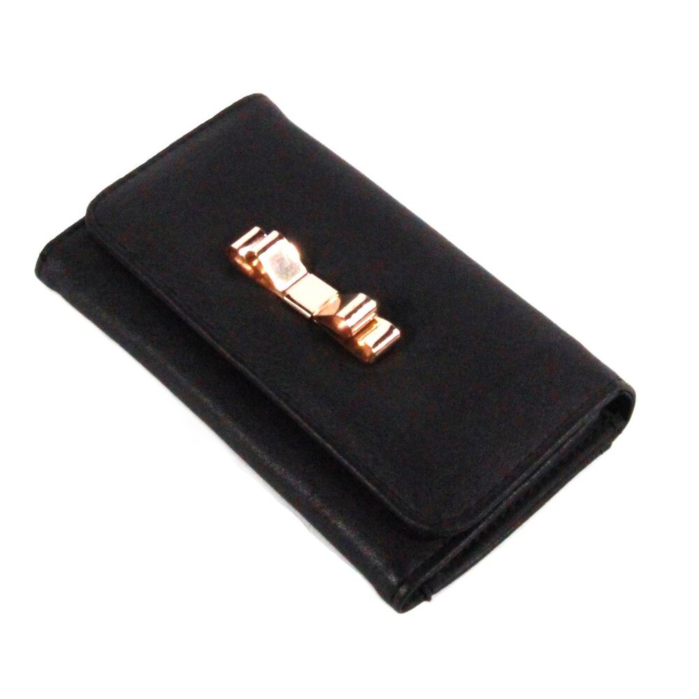 Black Womans Tri-Fold Wallet with Gold Tone Bow